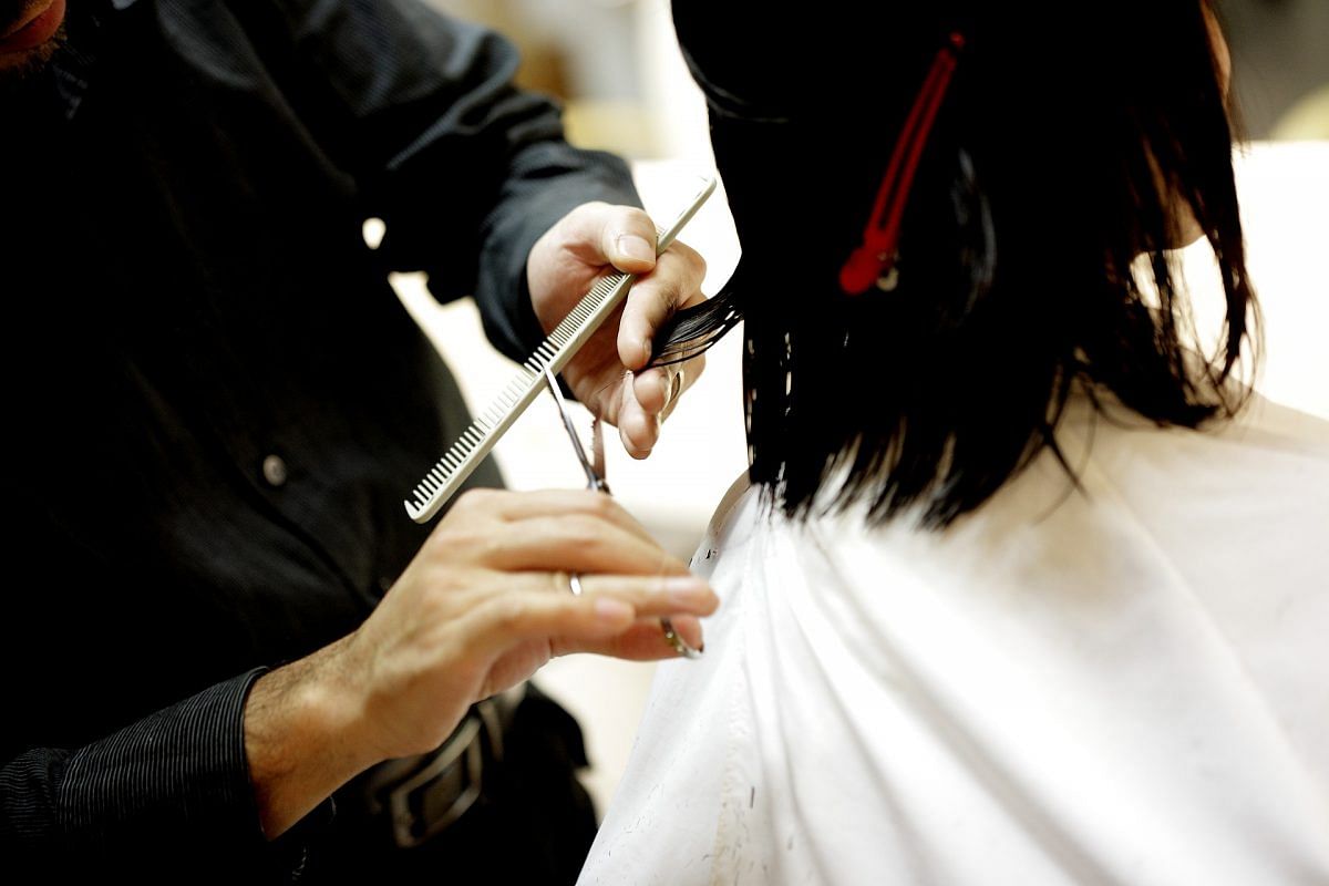 A woman getting haircut at a salon | pixabay