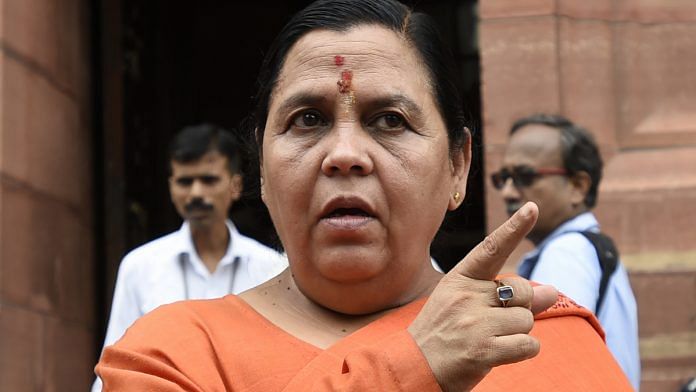 NEW DELHI, INDIA - JULY 18: Minister of Water Resources Uma Bharti at Parliament House on the opening day of the Monsoon Session on July 18, 2016 in New Delhi, India. A total of 25 bills, including the crucial GST Bill, are expected to come up for consideration and passage during the monsoon session. (Photo by Arvind Yadav/Hindustan Times via Getty Images)