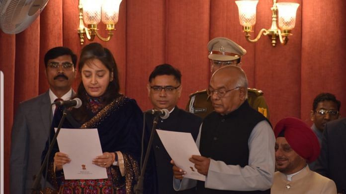 kamaldeep bhandari at the oath ceremony with haryana state governor staydev narain arya