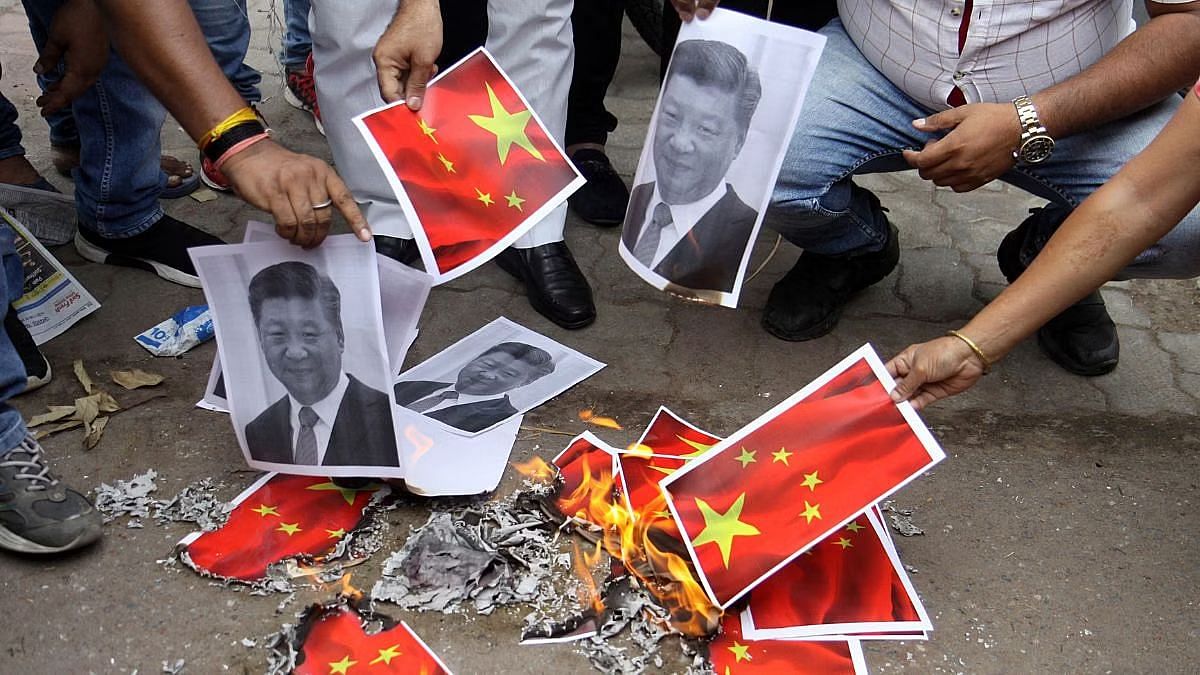 2020 में चीन के साथ एलएसी पर झड़प के बाद व्यापारी संघ के सदस्यों ने चीन के राष्ट्रपति शी जिनपिंग का पुतला जलाया। प्रतीकात्मक तस्वीर/एएनआई
