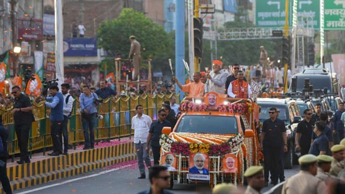 6 अप्रैल को उत्तर प्रदेश के गाजियाबाद में रोड शो के दौरान सीएम योगी आदित्यनाथ के साथ पीएम नरेंद्र मोदी | फाइल फोटो | सूरज सिंह बिष्ट/दिप्रिंट