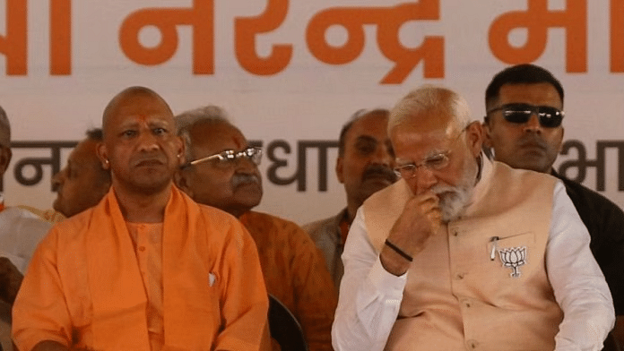 प्रधानमंत्री नरेंद्र मोदी और यूपी के मुख्यमंत्री योगी आदित्यनाथ लोकसभा चुनाव से पहले मेरठ में एक चुनावी रैली के दौरान | फोटो सूरज सिंह बिष्ट/दिप्रिंट