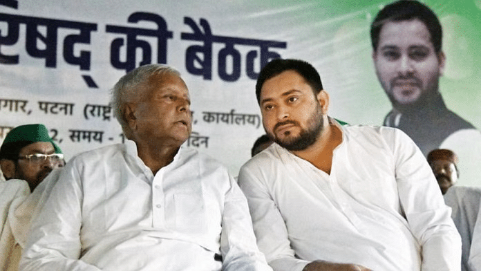 लालू प्रसाद यादव और उनके बेटे तेजस्वी की फाइल फोटो | एएआई