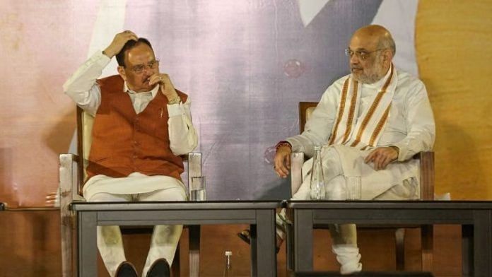 दिल्ली में भाजपा मुख्यालय में भाजपा के राष्ट्रीय अध्यक्ष जेपी नड्डा और गृह मंत्री अमित शाह | फोटो: सूरज सिंह बिष्ट/दिप्रिंट