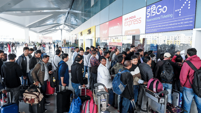 Patna | Flight passengers wait with their baggage as many IndiGo flight services stand cancelled